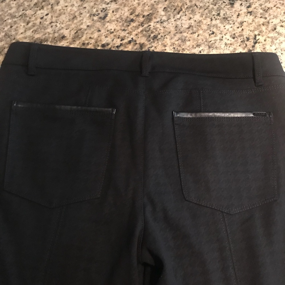 Skinny black zipper ankle pants